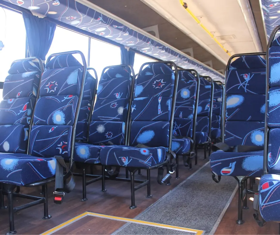 63-seater bus for hire in Gauteng – perfect for large group transport. Semi-luxury 63-seater bus with cloth seats and opening windows.
